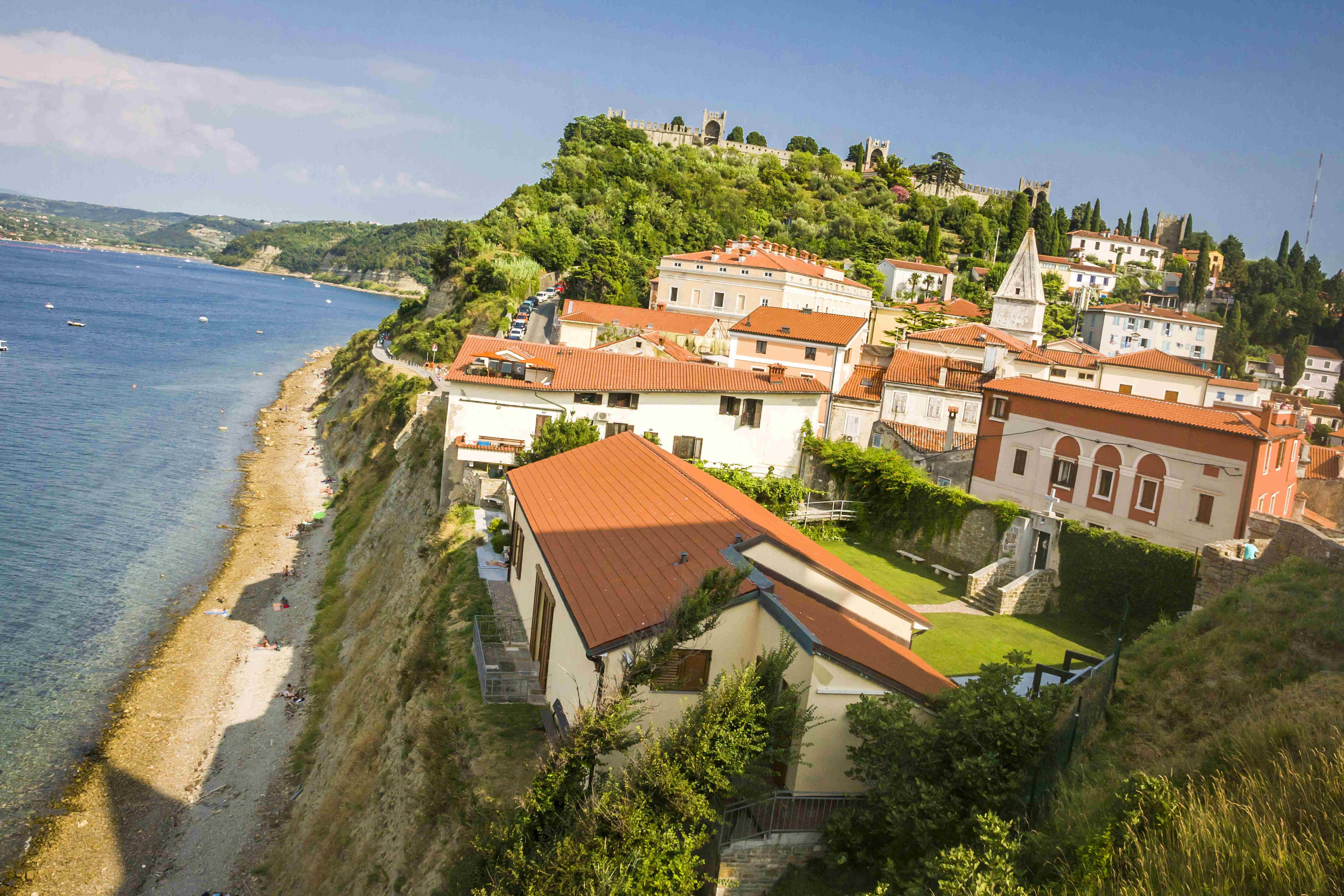 The natural beach under the church of St. George towards Fiesa